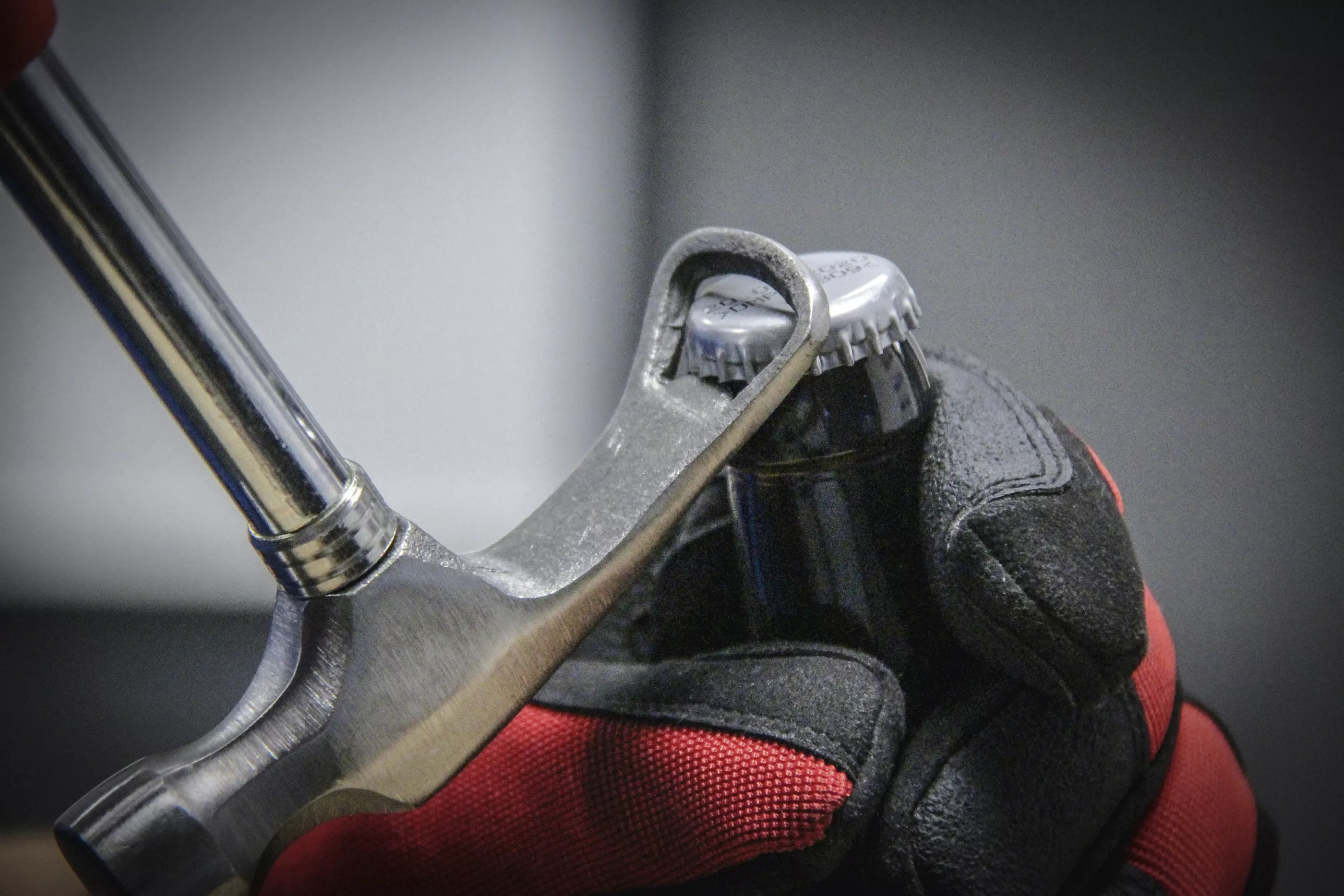 Hammare med kapsylöppnare